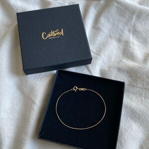 BNWT CATBIRD Gold Bangle